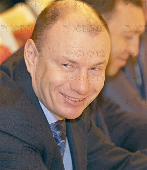 Moscow, russia, march 24, 2005, president of interros holding vladimir potanin smiles during a meeting held by russian president vladimir putin with representatives of the russian union of industrialists and entrepreneurs.
