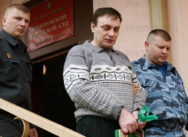 Moscow region, russia, april 15, 2005, former federal security service (fsb) officer mikhail trepashkin (c) leaves the building of the dmitrovsky district court, where he was sentenced to five years' imprisonment.