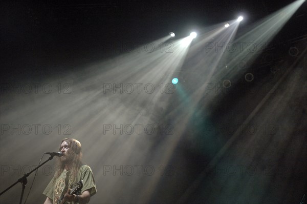 Egor (yegor) letov, soloist of russian punk band grazhdanskaya oborona, or gr,ob,, performs during a concert at luzniki sports complex, where their new album reanimation was presented, the name of the band can be translated from russian as 'the civil defence' (but 'grob' also translates as 'coffin'), may 27, 2005.