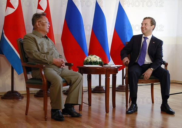 Ulan-ude, russia, august 24, 2011, russia's president dmitry medvedev (r) and kim jong-il (kim jong il), the leader of the democratic people's republic of korea (north korea), the chairman of the national defense commission, general secretary of the workers' party of korea, chat during a meeting in ulan-ude.