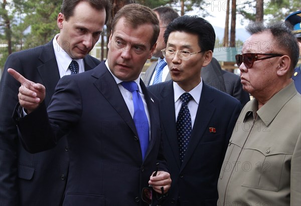 Ulan-ude, russia, august 24, 2011, russia's president dmitry medvedev and kim jong-il (kim jong il), the leader of the democratic people's republic of korea (north korea), the chairman of the national defense commission, general secretary of the workers' party of korea, l-r front, meet at sosnovy bor (pine tree forest) military post in ulan-ude.