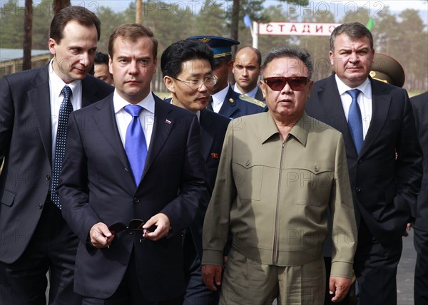 Ulan-ude, russia, august 24, 2011, russia's president dmitry medvedev and kim jong-il (kim jong il), the leader of the democratic people's republic of korea (north korea), the chairman of the national defense commission, general secretary of the workers' party of korea, l-r front, meet at sosnovy bor (pine tree forest) military post in ulan-ude.