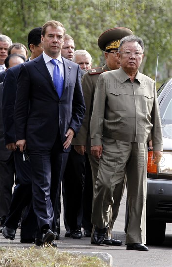 Ulan-ude, russia, august 24, 2011, russia's president dmitry medvedev and kim jong-il (kim jong il), the leader of the democratic people's republic of korea (north korea), the chairman of the national defense commission, general secretary of the workers' party of korea, l-r front, meet at sosnovy bor (pine tree forest) military post in ulan-ude.