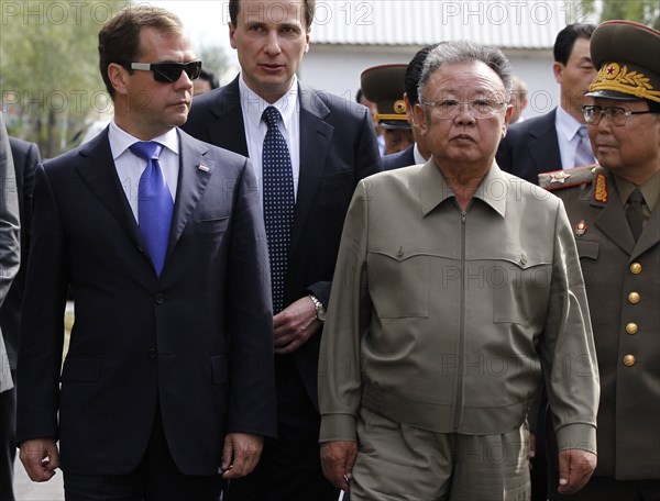 Ulan-ude, russia, august 24, 2011, russia's president dmitry medvedev and kim jong-il (kim jong il), the leader of the democratic people's republic of korea (north korea), the chairman of the national defense commission, general secretary of the workers' party of korea, l-r front, meet at sosnovy bor (pine tree forest) military post in ulan-ude.