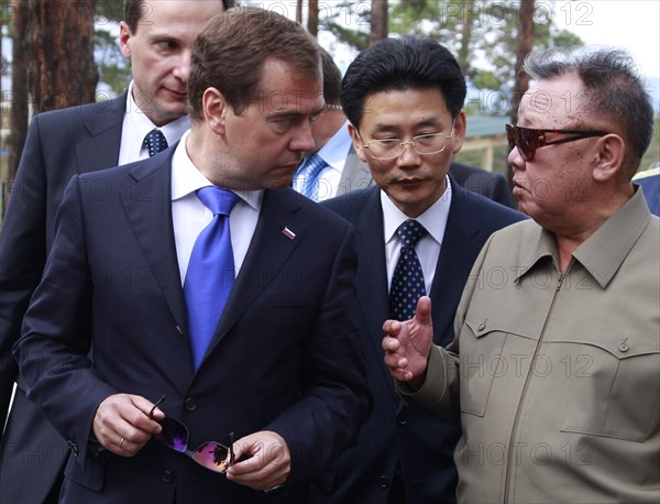 Ulan-ude, russia, august 24, 2011, russia's president dmitry medvedev and kim jong-il (kim jong il), the leader of the democratic people's republic of korea (north korea), the chairman of the national defense commission, general secretary of the workers' party of korea, l-r front, meet at sosnovy bor (pine tree forest) military post in ulan-ude.