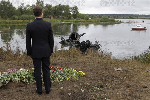 Yaroslavl region, russia, september 8, 2011, president of russia dmitry medvedev laying flowers at the site of the yak-42 plane crash which took the lives of lokomotiv ice hockey team players and coaches.