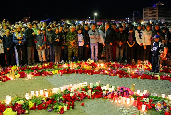 Magnitogorsk, chelyabinsk region, russia, september 9, 2011, flowers and lit candles are placed outside arena metallurg stadium in magnitogorsk to commemorate hc lokomotive yaroslavl team players who died in a plane crash on september 7.