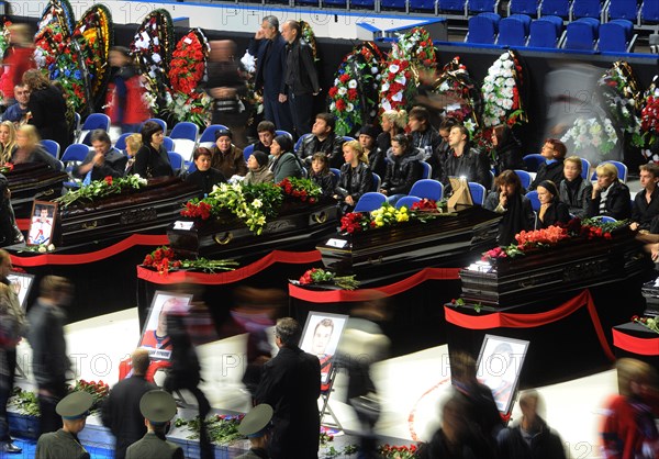 Yaroslavl, russia, september 11, 2011,people paying their last respects to the lokomotiv ice hockey players killed in a plane crash on september 7.