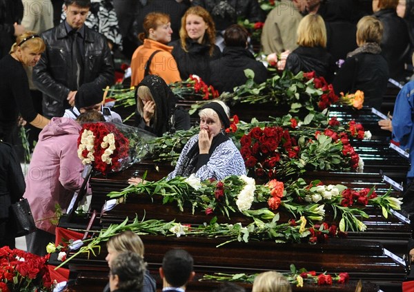 Yaroslavl, russia, september 11, 2011,people paying their last respects to the lokomotiv ice hockey players killed in a plane crash on september 7.