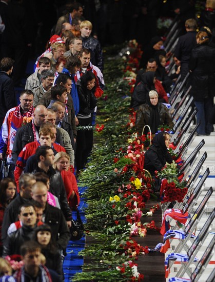 Yaroslavl, russia, september 11, 2011,people paying their last respects to the lokomotiv ice hockey players killed in a plane crash on september 7.