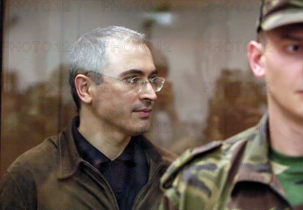 Moscow, russia, september 22, former head of yukos mikhail khodorkovsky leaves the courtroom after hearing that the moscow city court has reduced his and p, lebedev's sentences from 9 to 8 years of imprisonment.