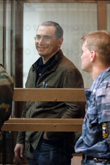 Moscow, russia, september 22, 2005, former head of yukos mikhail khodorkovsky leaves the courtroom after hearing that the moscow city court has reduced his and p, lebedev's sentences from 9 to 8 years of imprisonment.