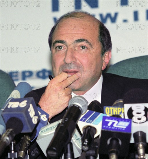 Moscow, russia, september 7, oil-to-media tycoon boris berezovsky pictured holding his chin at a press conference he gave here on thursday, berezovsky announced the names of the persons, journalists and people from the 'creative intelligentsia', whom he would give up his stake in public russian television (ort) for 4 years.
