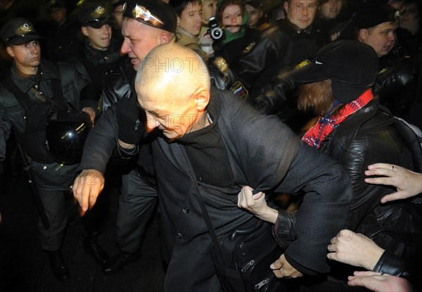 Moscow, russia, october 12, 2011, left front movement’s coordinator konstantin kosyakin being detained as demonstrators tried to break a police cordon during an authorised day of wrath protest in triumfalnaya square.