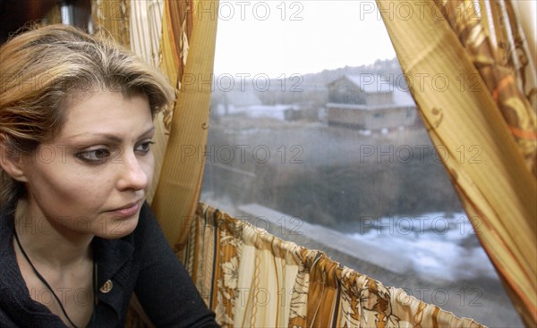 Chita region, russia, october 29, 2005, inna khodorkmovskaya, wife of former yukos ceo mikhail khodorkovsky, travels aboard the krasnokamensk-chita train after visiting husband who serves his term in penal colony yag 14/10 in krasnokamensk.