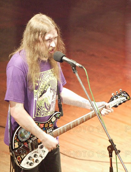 Moscow, russia, november 6, 2005, yegor letov, civil defense leader, sings at a concert given by the rock group at the gorbunov house of culture.