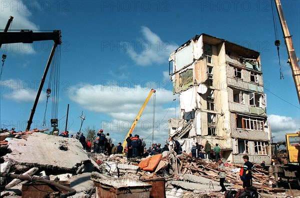 Makhachkala, russia, september 7, 1999, the death toll from a blast in a 5-storey dwelling house in the daghestani town of buinaksk occurred on sept,4, has reached 61, however, this figure is not final as the clearing the debris is still in progress (ops), the list of casualties includes 21 children and 18 women, ten victims have not yet been identified, altogether 145 people were injured by the blast.