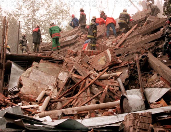 Moscow,russia, september 13, 1999, rescuers shown working at the rubble of the apartment block that was blasted last night on moscow's kashirskoye shosse, southeasteen municipal district, here on monday, twenty-two bodies, including of two children, have been recovered as of 8,30 a,m, moscow time from the debris,nine people have been hospitalised with injuries, the eight-storey apartment block was built in 1959, preliminary information suggests that its basement was leased to somebody.