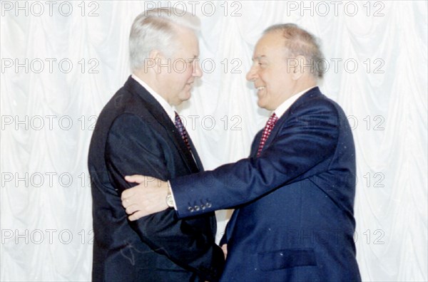 Russian president boris yeltsin and azerbaijani president geidar aliyev greet each other warmly during the meeting in the kremlin jan,18, geidat aliyev arrived in moscow today to take part in the cis summit january 19, 1996.