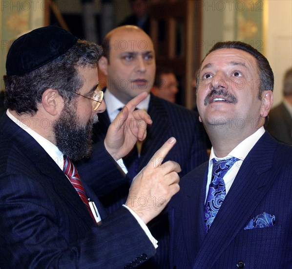 Moscow, russia moscow chief rabbi pinchas goldschmidt (l) and president of the ast group of companies telman ismailov are pictured during the reception that is held in the run-up to the 100th anniversary of the moscow choral synagogue.