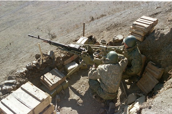 A machinegun emplacement of the itum-kale russian borderguards detachment stationed in the south of argun ravine in chechnya where the antiterrorist operation is in full swing now, the russian borderguards secure the chechen part of the russian- georgian frontier from any breaking through of the armed bandits, chechnya, russia, february 24, 2000.