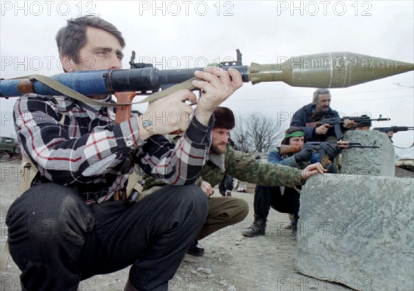 Small groups of chechen rebels are putting up resistance to police and federal troops in the outskirts of grozny, the situation in the centre of grozny is returning to calm, a dudaev militant pictured at the rebel position in zavodskoy district of the city, march 11, 1996.