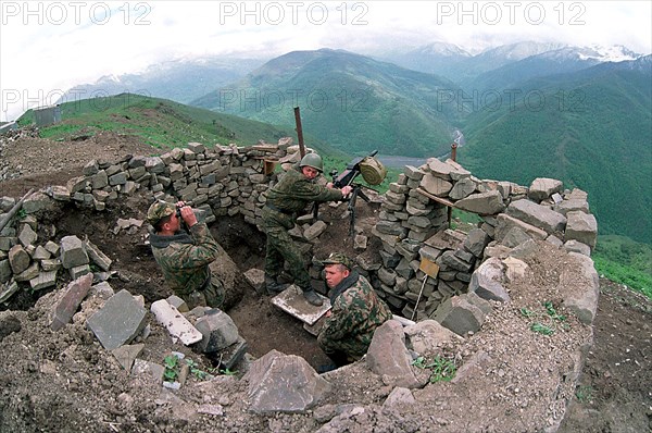 Such self-made shelters of chopped stones prevent russian border guards of itum-kala detachment from militant fire, the detachment keeps a sight on the 80 km long section in argun gorge, defending this high mountain area from chechen militants, for the last half of the year russian soldiers eliminated 4 bases, ammunition depot, 50 mititants' shelters, chechnya, russia, june 27, 2000.