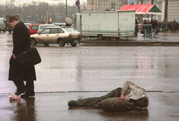 Homeless man on the streets of moscow, november 1998.