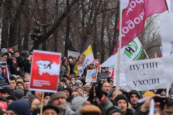 Moscow, russia, december 10, 2011, people attend an authorized rally 'for honest elections' in moscow's bolotnaya square to protest against electoral fraud at recent elections to the state duma.