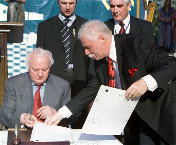 Georgia, august 21, 2003, georgian president eduard shevardnadze (l) and well-known businessman badri patarkatsishvili (r) signed documents on the beginning of construction a health resort 'imedis kalaki '(town of hope) located between the cities of poti and batumi , the construction will be financed by patarkatsishvili.