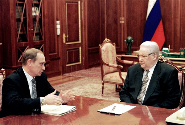 Moscow, russia, march 25, 1999, russian president boris yeltsin (r) talking with director of the russian federal security service (fsb) vladimir putin in the kremlin,on monday vladimir putin was appointed secretary of the security council of the russian federation, he will continue to fulfil his duties as director of the federal security service (fsb) of the russian federation.