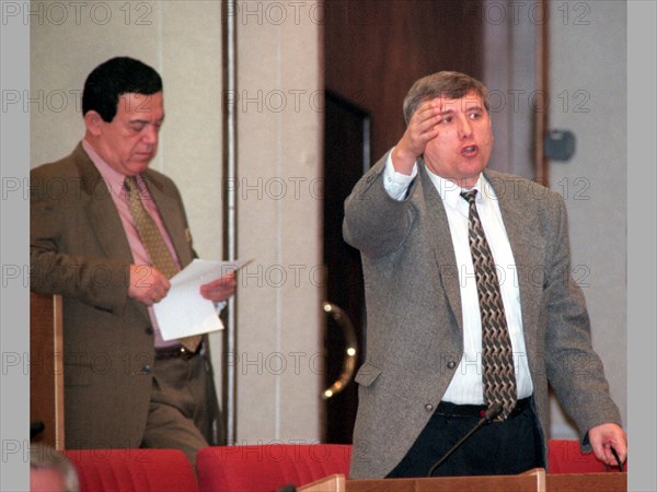 Moscow, russia, may 14, 1999, the state duma continued on friday to discuss the item 'on accusations against the president of the russian federation,,' the lawmakers heard the opinion of experts, invited to the session, of witnesses and participants in the developments,which cause a outbust of hot disputes , picture shows deputies iosif kobzon (l) and sergei yushenkov (r) gesturing during the discussion.