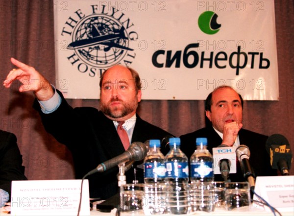 Moscow, russia, september 27, 1999, chief operation director of the flying hospital goracio edward 'chip' mann /l/ and the well-known russian businessman boris berezovsky pictured during a press conference, dedicated to the beginning of the mission conducted in russia by doctors-volunteers, at the novotel hotel here on monday, the mission has become possible thanks to the sponsorship of the sibneft company and the famous tycoon.
