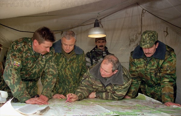 Chechnya, russia, december 10, 1999, commander of eastern army group gennady troshev (second right) seen assigning a mission during combat operations at the chechen town of argun, located approximately ten kilometres southeast of grozny, the units of the western group of federal troops in the northern caucasus have fully blocked off argun.