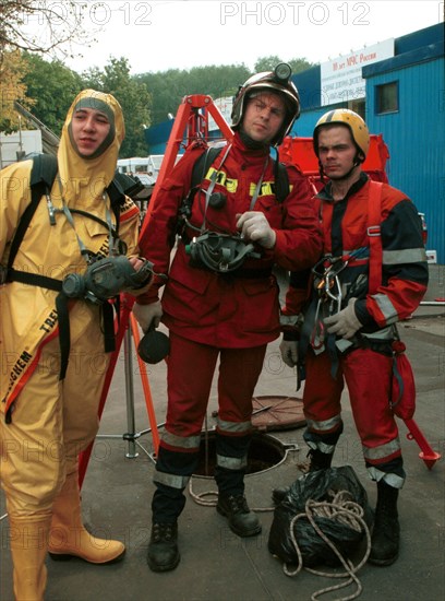 (left to right) mikhail sysoyev, vadim mikhailov (leader of the organization diggersof planet underground), and roman shkryabenkov exhibiting their professional services at the 'state of rescue, 2000' moscow, russia, september 9, 2000.