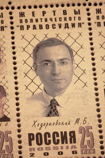 Moscow, russia, february 24, 2006, a postal stamp depicting former yukos ceo mikhail khodorkovsky, who is serving a long sentence for tax evasion, is on view at the photo exhibition 'political 'justice' and political prisoners in the present-day russia' at the sakharov museum in moscow.