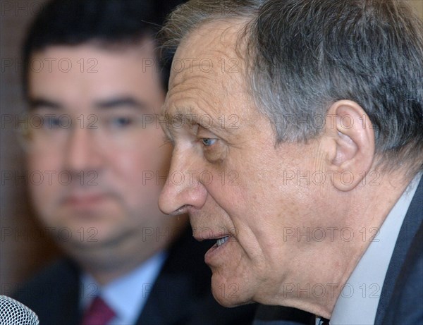 Moscow, russia, april 14, 2006, vladislav tetyukhin, general director of the world's largest titanium producer vsmpo-avisma corporation (verkhnesaldinsk metallurgical conglomerate), speaks at the signing of a deal with boeing to create a joint venture, pictured at left is mike cave, current boeing commercial airplanes' (bca) vice-president for aircraft programmes.