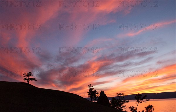 Irkutsk region, russia, september 5, 2006, sunset over lake baikal and olkhon island.