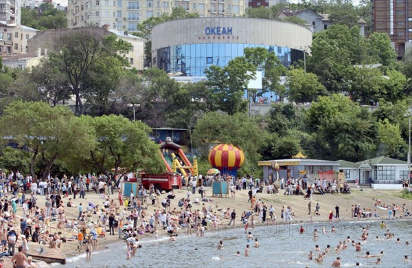 Vladivostok, russia, a view of the city beach in sportivnaya gavan (harbour) and the ocean cinema in vladivostok.