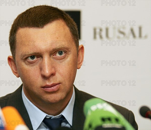 Moscow, russia, october 9, 2006, rusal chairman oleg deripaska seen during the signing of a merger deal, russian aluminium giants rusal (russian aluminium) and sual (siberian ural aluminium company) and glencore international ag (switzerland) have signed a merger deal to create the worldi´s biggest aluminium producer.