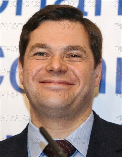 Moscow, russia, november 21, 2006, severstal board chairman alexey mordashov smiles at a meeting with american chamber of commerce in russia representatives, unseen, at the national hotel, moscow.
