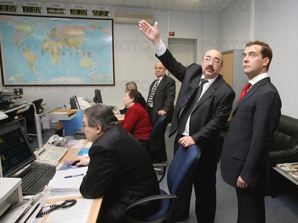 Russia's first deputy prime minister dmitry medvedev, far right, listens to acting kosmicheskaya svyaz general director yuri izmailov, 2nd right, at the main office of kosmicheskaya svyaz satellite operator, where medvedev chaired a meeting of the broadcasting development commission,  moscow, russia, december 26, 2006.