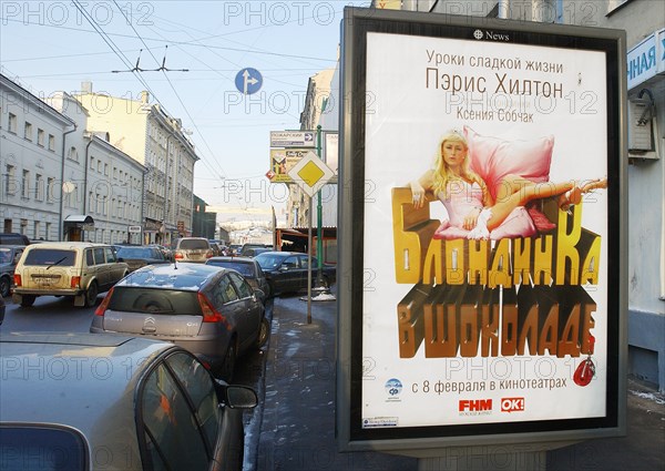An advertisement for the movie 'blonde in chocolate' on a street in moscow, the r-rated william heins comedy 'pledge this!' has been released in russia under the title 'blonde in chocolate', paris hilton who stars as victoria english is voiced by socialite and tv reality show host kseniya sobchak, february 2, 2007.