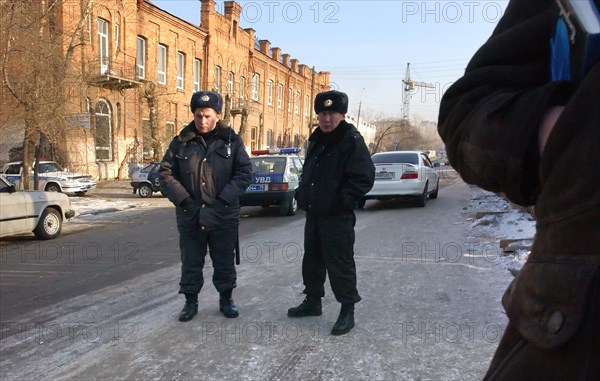 Chita, russia, february 7, 2007, police officers stand guard outside the ingoda regional court building where a hearing has been held to consider mikhail khodorkovksy's continued detention, and a complaint filed by platon lebedev against an investigator from the prosecutor general's office.