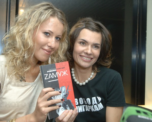 Tv personality ksenia sobchak (l) and businesswoman, writer oksana robski, author of the novel casual, at a press conference on their new book 'zamuzh za millionera ili brak vysshego sorta' [getting married to a male millionaire or top quality marriage], at the bukva bookstore in moscow, russia, april 5, 2007.