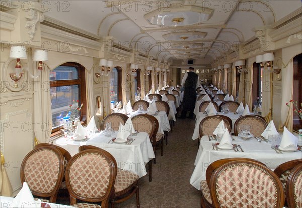 Moscow, russia, june 4, 2007, inside the dining car of the golden eagle express, the new $25 million fully en-suite private train has been launched by long-distance luxury train operator gw travel limited to serve the world's longest railway line between moscow and vladivostok.