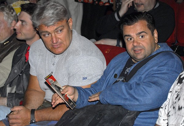 Tv host, athlete vladimir turchinsky, a,k,a, dynamite, (l) and actor sergei rost at moscow's oktyabr cinema where quentin tarantino's highway thriller death proof received its russian premiere, june 5, 2007.