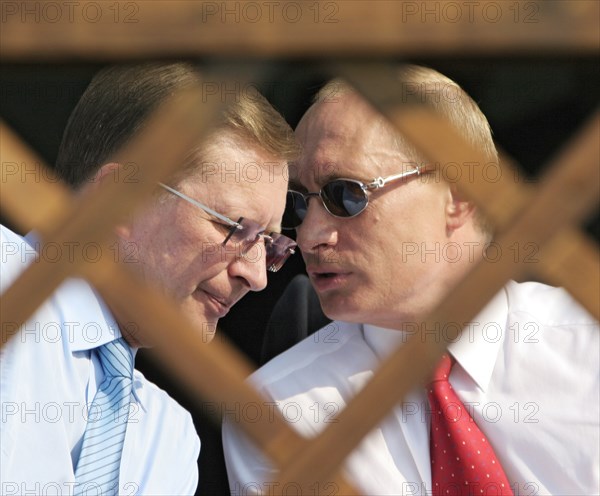 Russiai´s first deputy pm sergei ivanov and russian president vladimir putin, l-r, talk at the 8th international aviation & space salon maks 2007  in the town of zhukovsky, moscow region of russia, august 17, 2007.