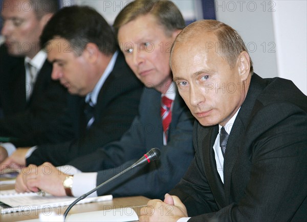 Russian president vladimir putin, first deputy prime minister sergei ivanov, defence minister anatoly serdyukov (r-l) attend a meeting on developing the kamchatka region, vilyuchinsk, kamchatka, russia, september 5, 2007.