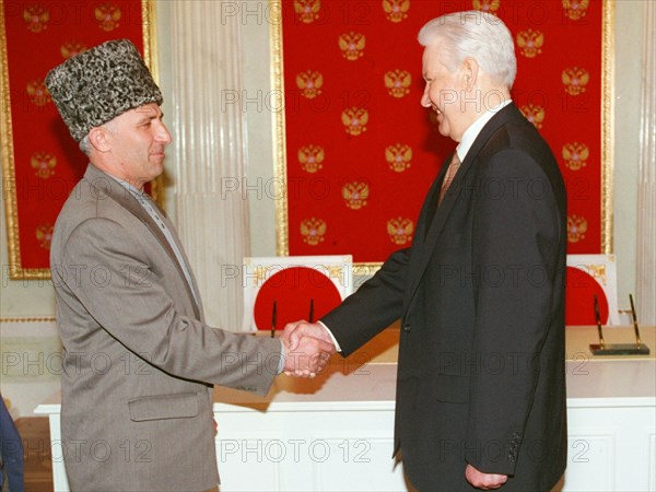 A treaty on peace and principles of mutual relations between the russian federation and the chechen republic of ichkeria has been signed today, on may 12, 1997 by president boris yeltsin and chechen leader aslan maskhadov, the picture shows the presidents shaking hands after the signing.